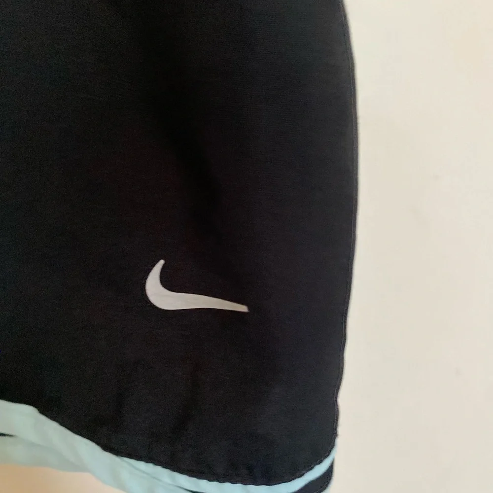 DRI – FIT NIKE blue and black running shorts ladies size XL